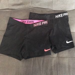 2 pair of Nike pro compression shorts. Size medium